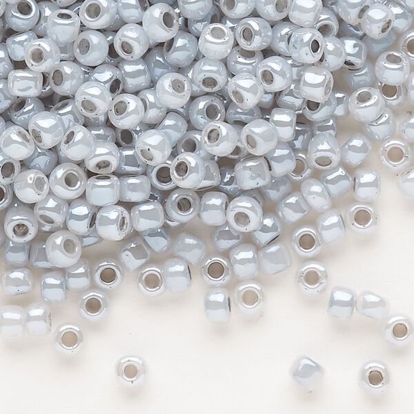 Seed bead, Dyna-Mites™, glass, opaque ceylon pastel grey, #6 round. Sold per 1/2 kilogram pkg. image number 0
