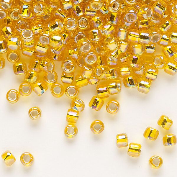 Seed bead, Dyna-Mites™, glass, silver-lined translucent rainbow orange, #6 round with square hole. Sold per 40-gram pkg. image number 0