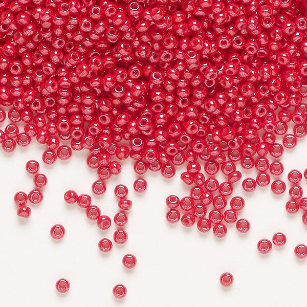 Seed bead, Preciosa Ornela, glass, opaque luster bright red coral, #11 rocaille. Sold per 50-gram pkg. image number 0