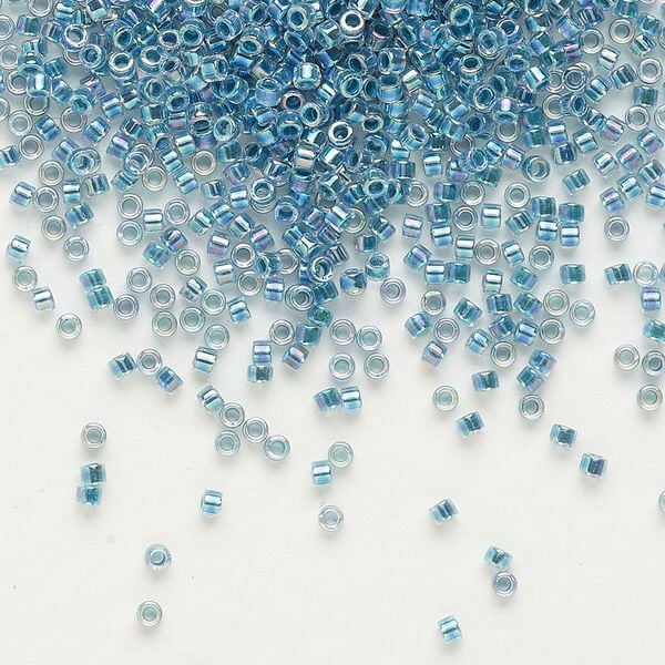Seed bead, Delica®, glass, pkg/50g, #11 round, translucent marine blue-lined rainbow crystal clear (DB-0058). image number 0