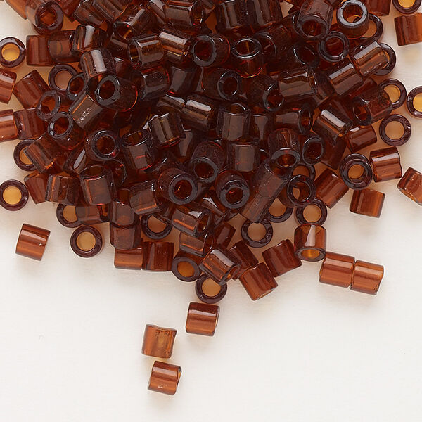 Seed bead, Delica®, glass, pkg/7.5g, #8 round, transparent dark topaz (DBL-0709). image number 0