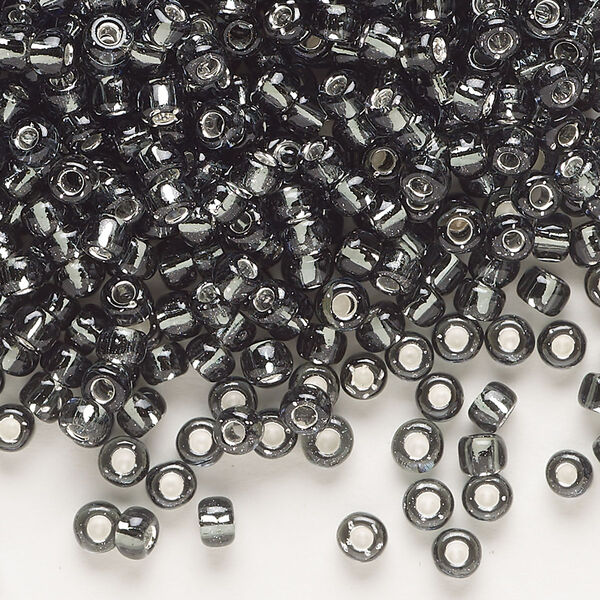 Seed bead, Dyna-Mites™, glass, transparent silver-lined gunmetal, #6 round. Sold per 1/2 kilogram pkg. image number 0