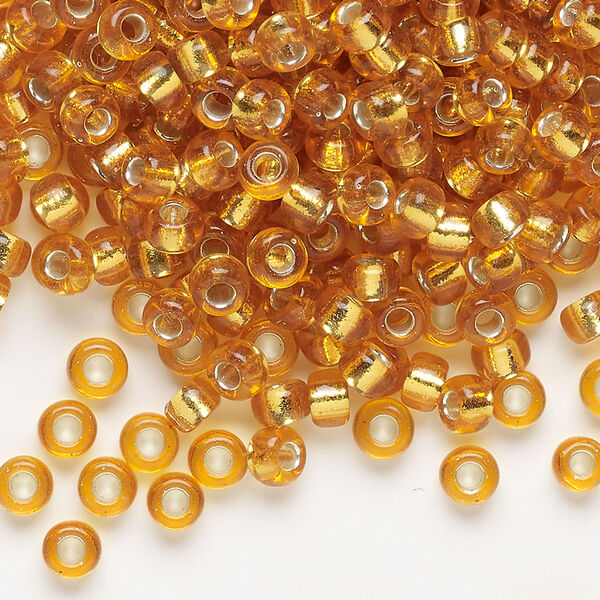 Seed bead, Miyuki, glass, pkg/25g, #6 rocaille, transparent silver-lined dark gold (RR-4). image number 0