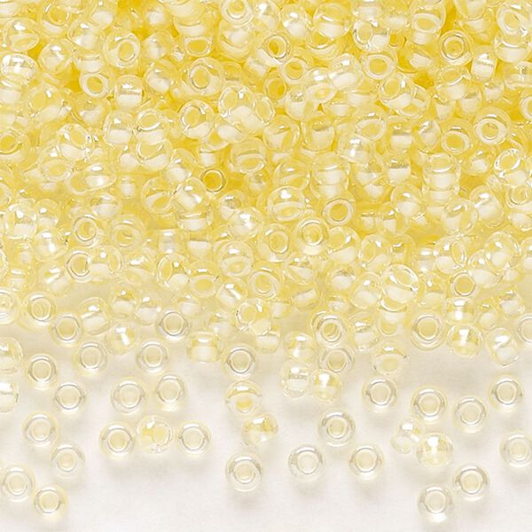 Seed bead, Preciosa Ornela Czech glass, pkg/500g, #11 rocaille, translucent color-lined luster pastel yellow, (382PY). image number 0