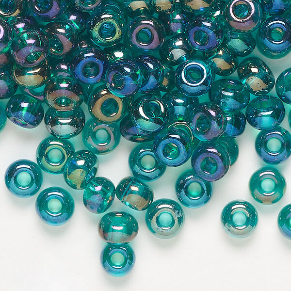 Seed bead, Preciosa Ornela, glass, translucent rainbow teal, #2 rocaille. Sold per 500-gram pkg. image number 0