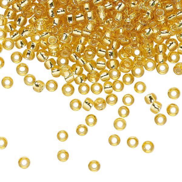 Seed bead, TOHO BEADS®, glass, pkg/50g, #8 round, transparent silver-lined light topaz (TR-08-22). image number 0