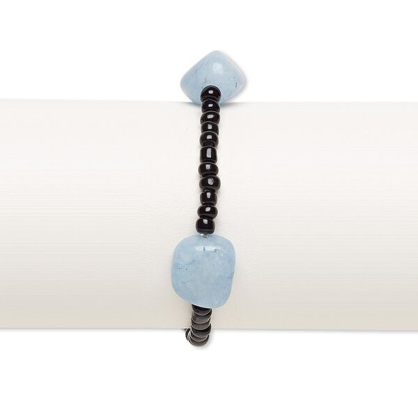 Bracelet, stretch, quartz (dyed) and glass, black and blue, 3x2mm-5x4mm rondelle and small to medium tumbled nugget, 7 inches. Sold individually. image number 0