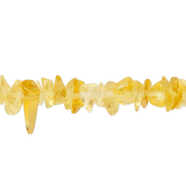 Bead, glass, translucent golden yellow, small to extra-large chip. Sold per 30-inch strand. image number 0