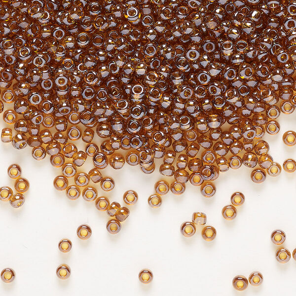 Seed bead, Preciosa Ornela Czech glass, pkg/50g, #10 rocaille, translucent luster topaz, (16090). image number 0