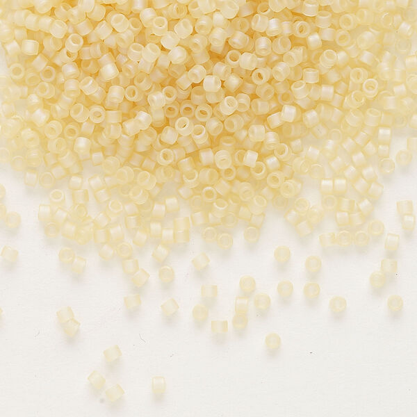 Seed bead, Delica®, glass, pkg/7.5g, #11 round, translucent matte rainbow pale topaz (DB-1287). image number 0