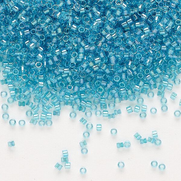 Seed bead, Delica®, glass, pkg/7.5g, #11 round, translucent aqua-lined luster crystal clear (DB-2382). image number 0