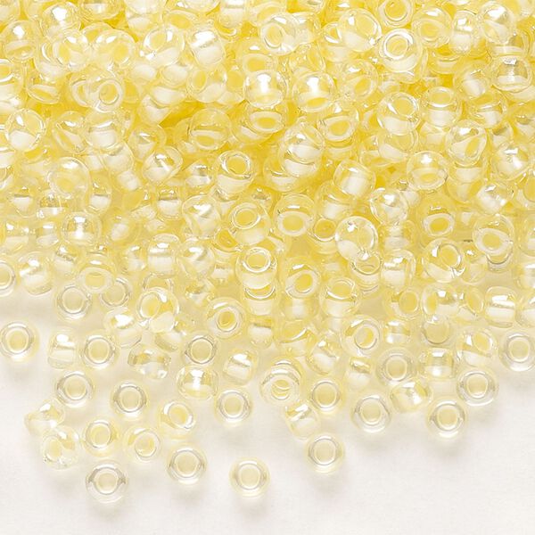 Seed bead, Preciosa Ornela Czech glass, pkg/50g, #8 rocaille, translucent color-lined luster pastel yellow, (382PY). image number 0