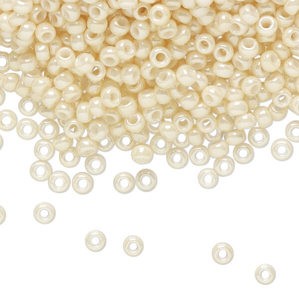 Seed bead, TOHO BEADS®, glass, pkg/50g, #8 round, opaque luster light beige (TR-08-123). image number 0