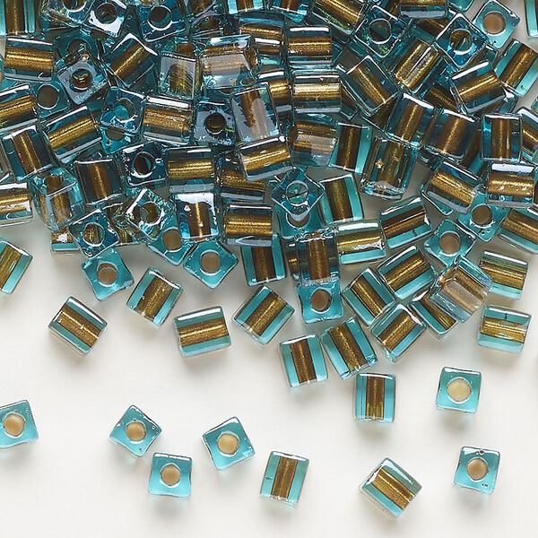 Seed bead, Miyuki, glass, pkg/250g, 3.5-3.7mm square, transparent brown inside dyed color blue (SB-2642). image number 0