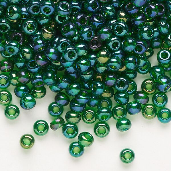 Seed bead, Preciosa Ornela Czech glass, pkg/500g, #6 rocaille, translucent rainbow medium green, (51060). image number 0