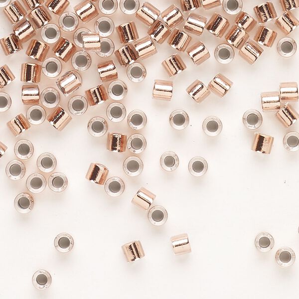 Seed bead, Delica®, glass, pkg/250g, #8 round, transparent copper-lined crystal clear (DBL-0037). image number 0