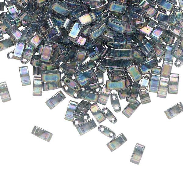 Seed bead, TILA®, glass, pkg/10g, 5x2.3mm half tila rectangle, translucent rainbow luster dark grey, (HTL-2440D). image number 0