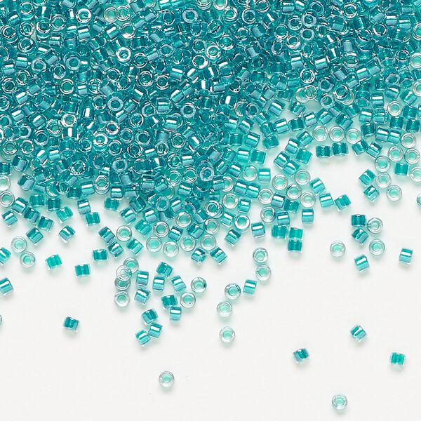 Seed bead, Delica®, glass, pkg/7.5g, #11 round, translucent dark aqua-lined luster crystal clear (DB-0918). image number 0