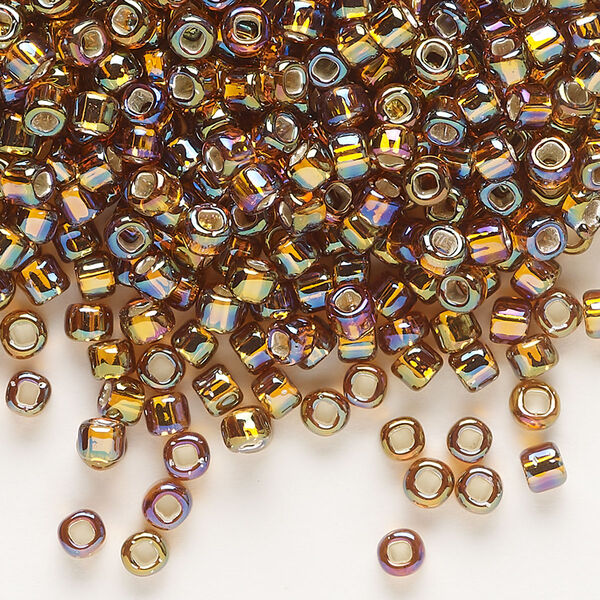 Seed bead, Dyna-Mites™, glass, silver-lined translucent rainbow root beer, #6 round with square hole. Sold per 1/2 kilogram pkg. image number 0