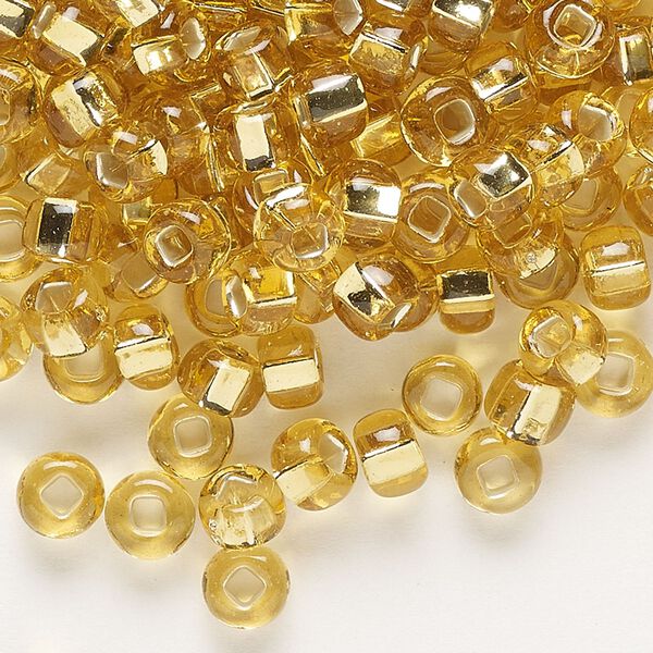 Seed bead, Preciosa Ornela, glass, transparent silver-lined light topaz, #2 rocaille with square hole. Sold per 500-gram pkg. image number 0