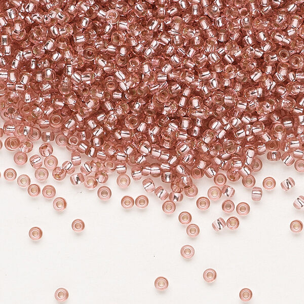 Seed bead, Preciosa Ornela Czech glass, pkg/500g, #11 rocaille, translucent solgel dyed silver-lined medium pink, (78193). image number 0