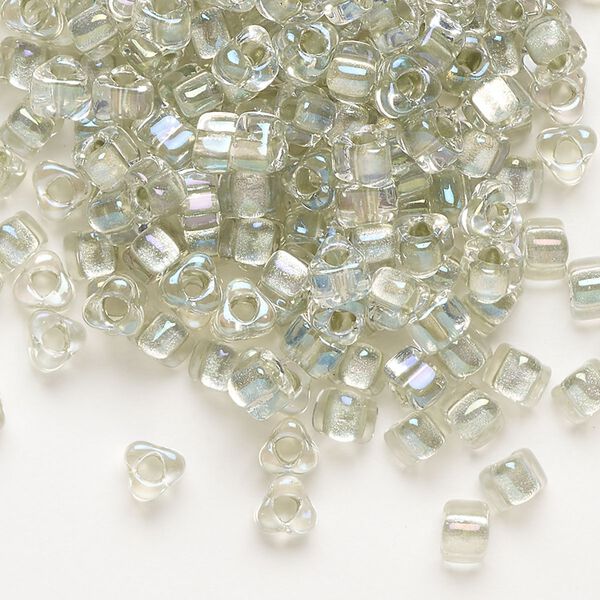 Seed bead, Miyuki, glass, transparent clear color-lined foam green, (TR1135), #5 triangle. Sold per 25-gram pkg. image number 0