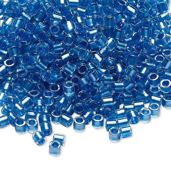 Seed bead, Delica®, glass, pkg/7.5g, #8 round, translucent blue-lined luster crystal clear (DBL-0905). image number 0