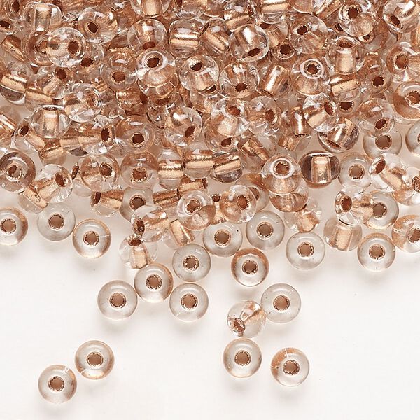Seed bead, Preciosa Ornela Czech glass, pkg/500g, #6 rocaille, transparent copper-lined clear, (68105). image number 0