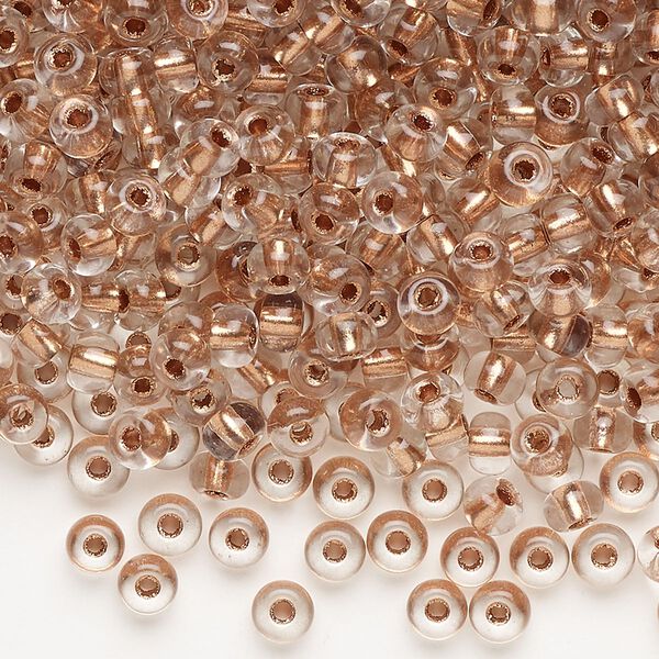 Seed bead, glass, pkg/100g, #6 round, translucent light copper-lined crystal clear. image number 0