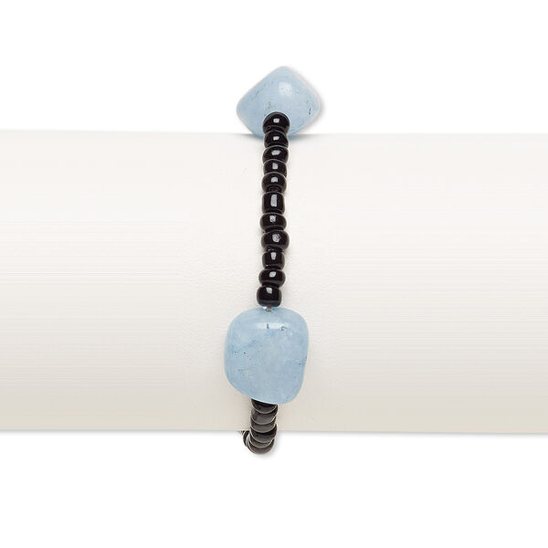 Bracelet, stretch, quartz (dyed) and glass, black and blue, 3x2mm-5x4mm rondelle and small to medium tumbled nugget, 7 inches. Sold individually. image number 0