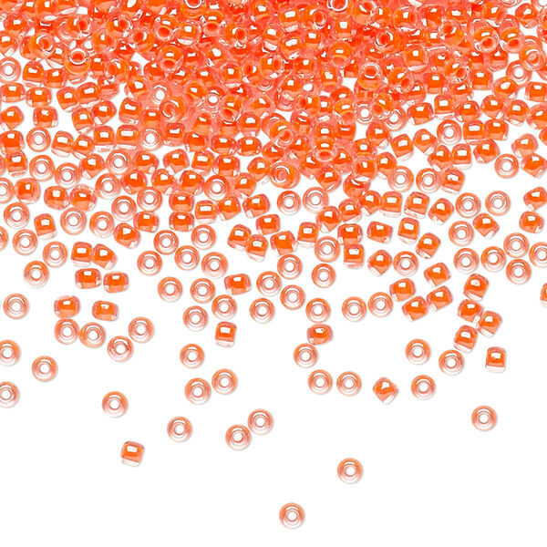Seed bead, TOHO BEADS®, glass, pkg/250g, #11 round, translucent luminous inside color neon salmon (TR-11-803). image number 0