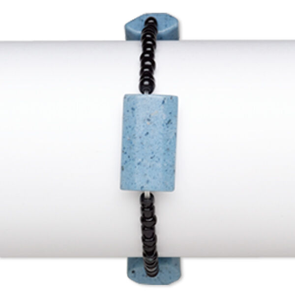 Bracelet, stretch, glass, opaque black and blue, 4x3mm-5x4mm rondelle and 24x14mm-25x16mm faceted puffed rectangle, 7 inches. Sold individually. image number 0
