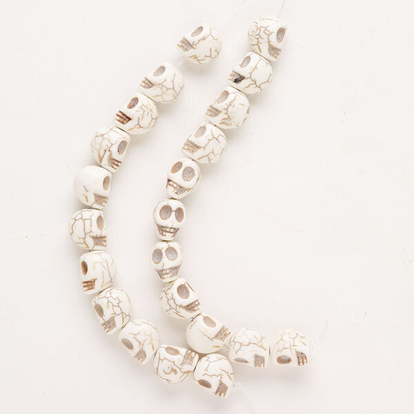 Bead, howlite (natural), 13x12mm-14x13mm skull with matrix, C grade, Mohs hardness 3 to 3-1/2. Sold per 10-inch strand, approximately 20 beads. image number 0