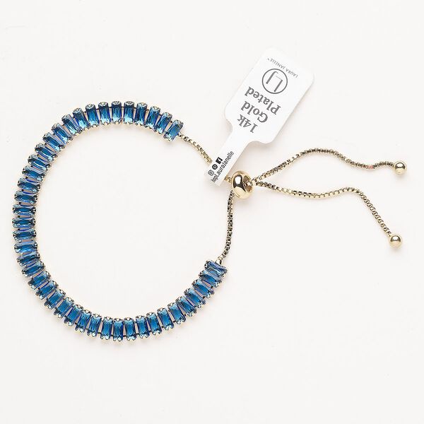 Bracelet, adjustable, brass / glass / silicone, pkg/1, 6 to 10 inches, gold plate and blue topaz. image number 0