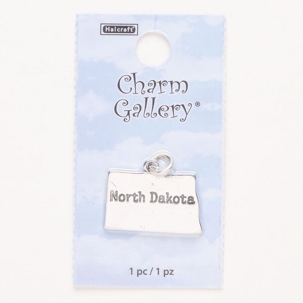 Charm, steel and enamel, pkg/1, silver finish and black, 23x14mm with "North Dakota." image number 0
