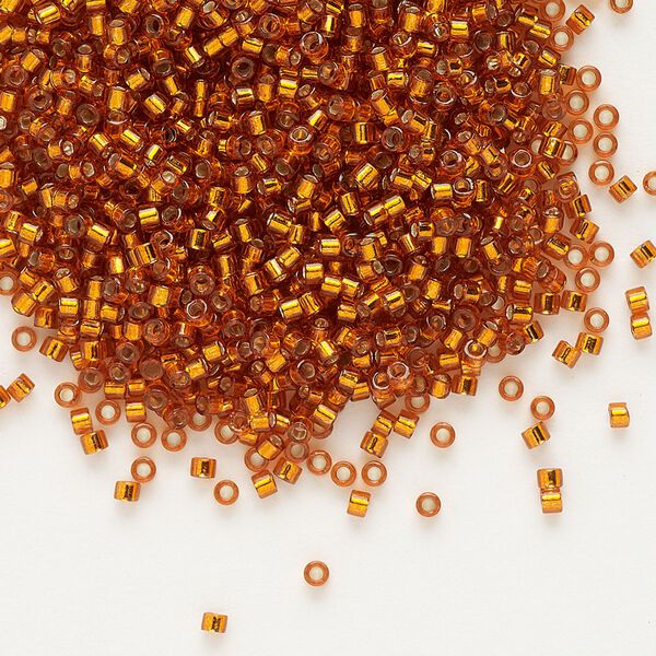Seed bead, Delica®, glass, pkg/50g, #11 round, transparent outside dyed silver-lined burnt orange (DB-1333). image number 0