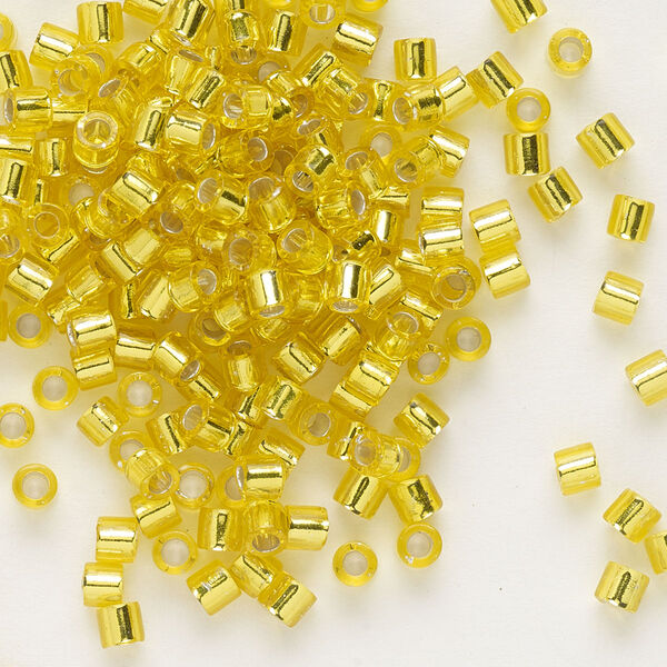 Seed bead, Delica®, glass, pkg/50g, #8 round, transparent silver-lined yellow (DBL-0145). image number 0