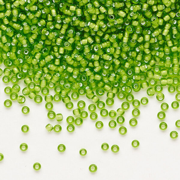 Seed bead, Preciosa Ornela, glass, transparent chalkwhite-lined lime green, #11 rocaille. Sold per 500-gram pkg. image number 0