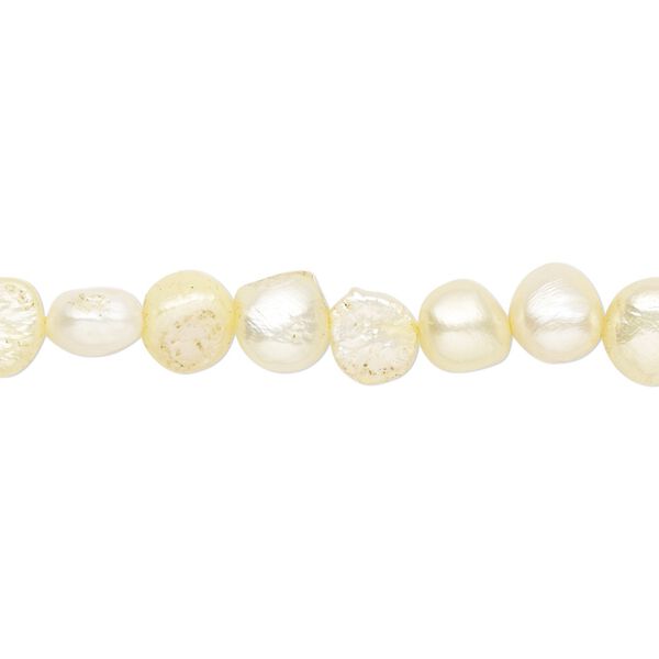 Pearl, cultured freshwater (dyed), daffodil, 5-6mm flat-sided potato with 0.4-0.6mm hole, D grade, Mohs hardness 2-1/2 to 4. Sold per 15-inch strand. image number 0
