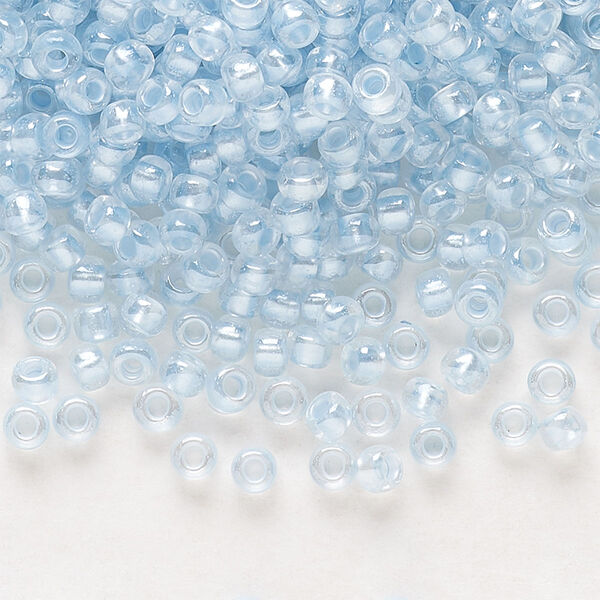 Seed bead, Preciosa Ornela Czech glass, pkg/500g, #8 rocaille, translucent color-lined luster pastel blue, (382PB). image number 0