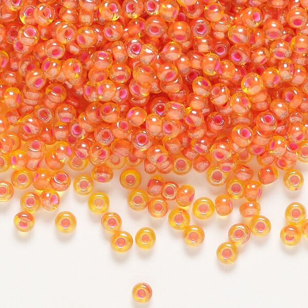 Seed bead, Preciosa Ornela, glass, translucent pink-lined luster yellow amber, #8 rocaille. Sold per 50-gram pkg. image number 0