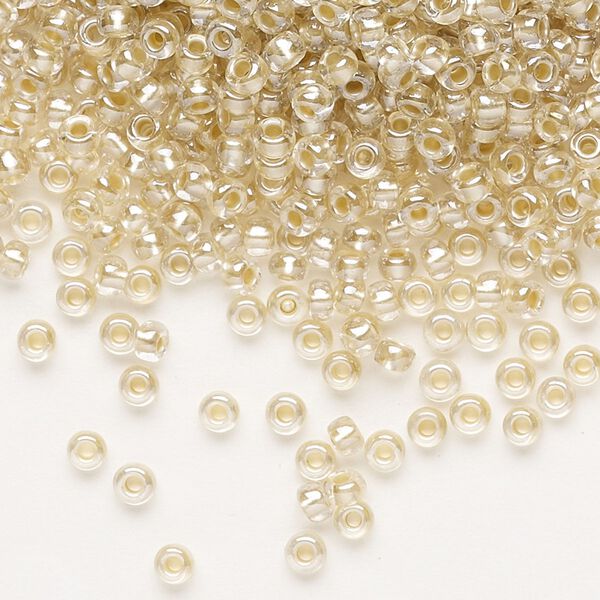 Seed bead, Preciosa Ornela, glass, translucent mocca pearl-lined crystal clear, #8 rocaille. Sold per 500-gram pkg. image number 0