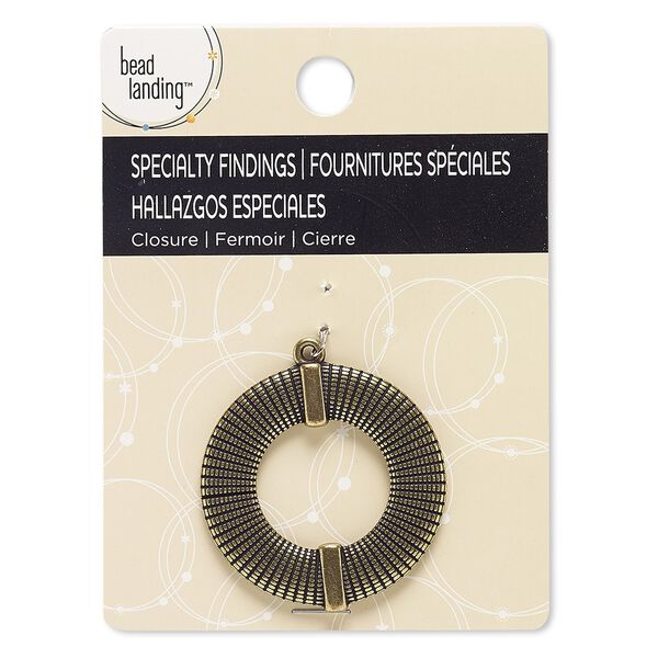 Focal, antiqued brass-finished "pewter" (zinc-based alloy), 39mm textured open round. Sold individually. image number 0