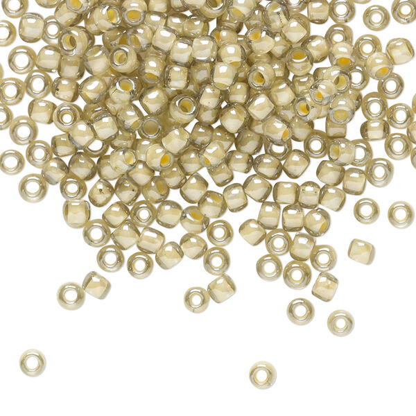 Seed bead, TOHO BEADS®, glass, pkg/7.5g, #8 round, opaque orange crème-lined black diamond (TR-08-369). image number 0