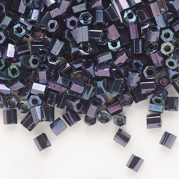 Seed bead, Dyna-Mites™, glass, opaque iris blue, #6 hex 2-cut. Sold per 1/2 kilogram pkg. image number 0