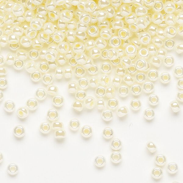 Seed bead, Miyuki, glass, pkg/50g, #8 rocaille, opaque butter cream luster alabaster (RR-527). image number 0