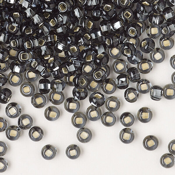Seed bead, Preciosa Ornela Czech glass, pkg/50g, #6 rocaille, transparent silver-lined grey, (47010). image number 0