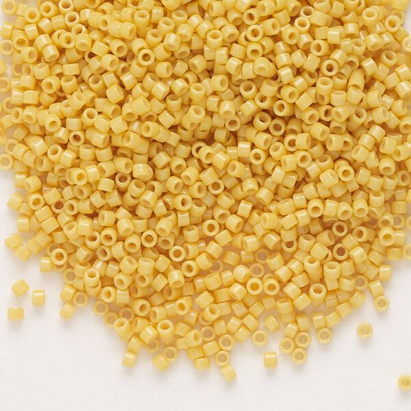 Seed bead, Delica®, glass, pkg/50g, #11 round, Duracoat® opaque outside dyed light yellow (DB-2102). image number 0