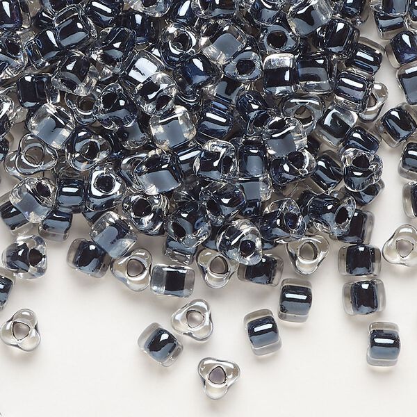 Seed bead, Miyuki, glass, transparent clear color-lined black, (TR1106), #5 triangle. Sold per 250-gram pkg. image number 0