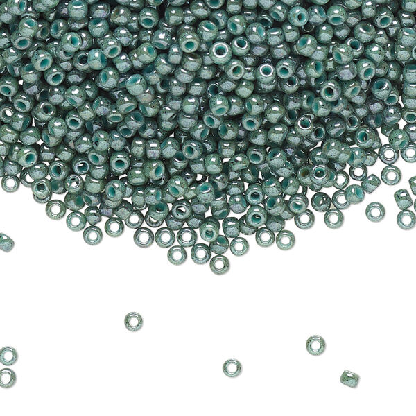 Seed bead, TOHO BEADS®, glass, pkg/7.5g, #11 round, opaque marbled turquoise blue (TR-11-1207). image number 0